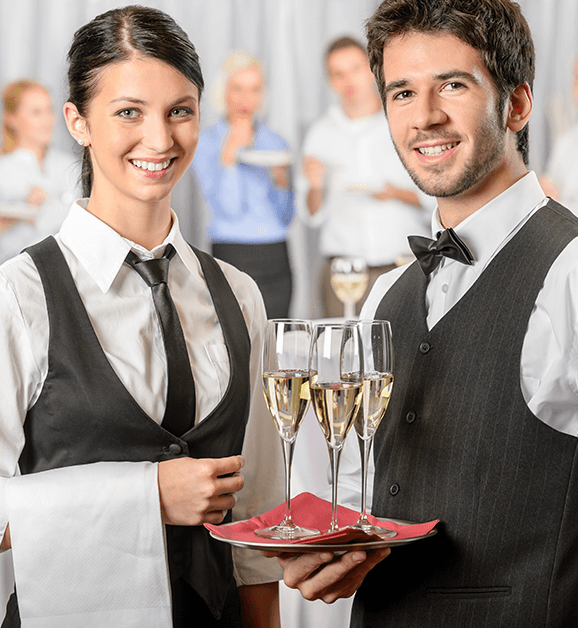 professional caterers happily serving customers melbourne